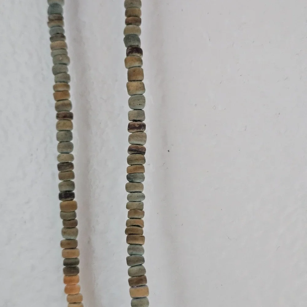 Native Treasure surfboard and coconut bead necklace beachy dolphin pendant